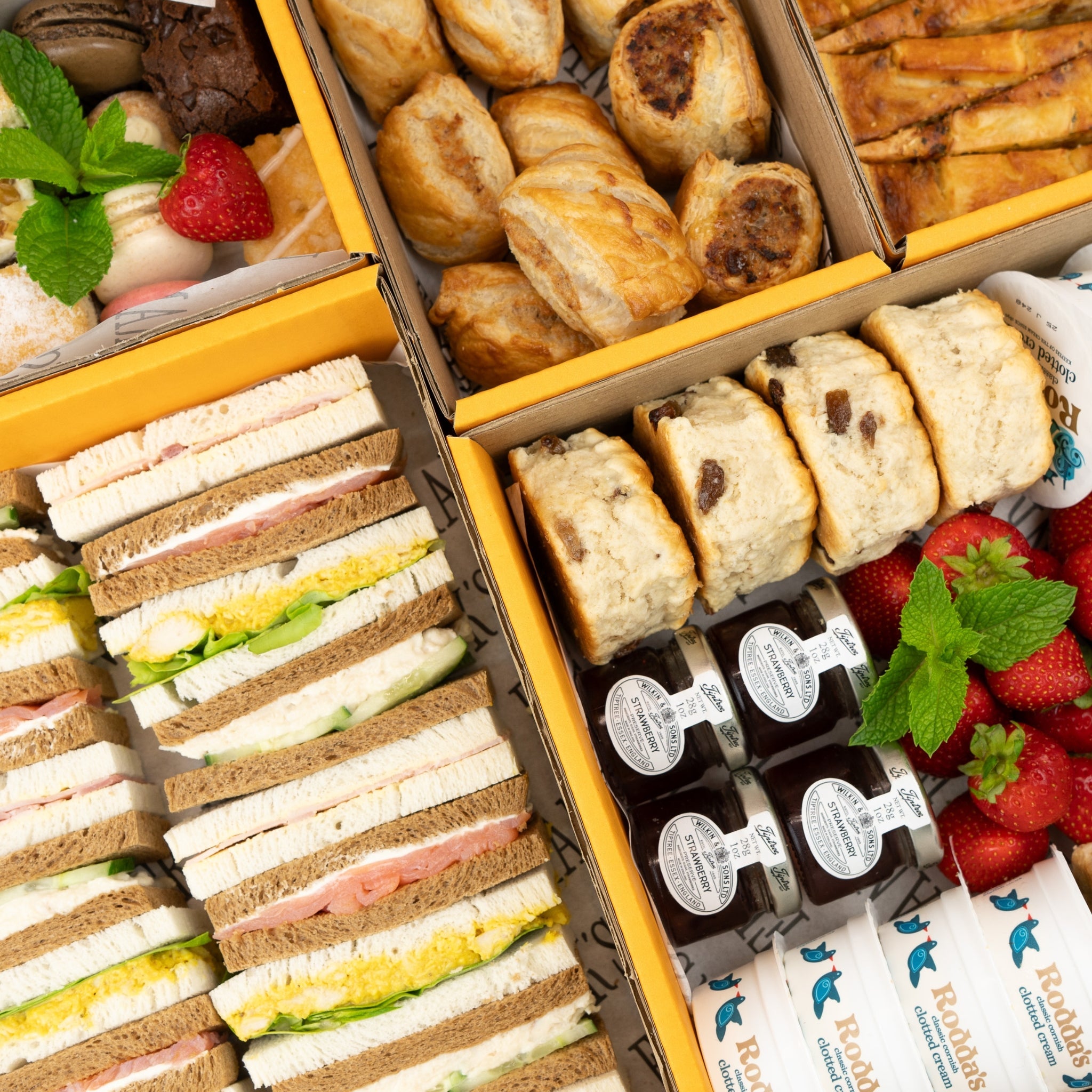 Afternoon Tea delivery in London with sandwiches, cakes, scones and picky bits