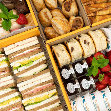 Afternoon Tea delivery in London with sandwiches, cakes, scones and picky bits